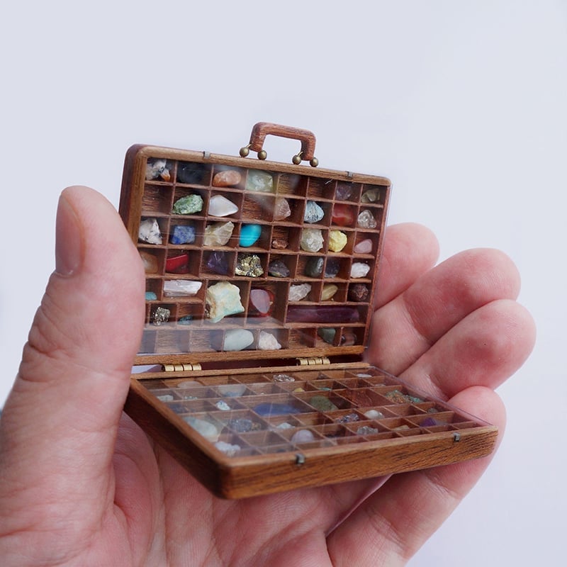 Collection Of Stones In A Suitcase